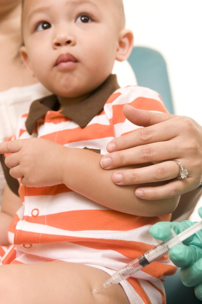 Young boy receiving vaccine