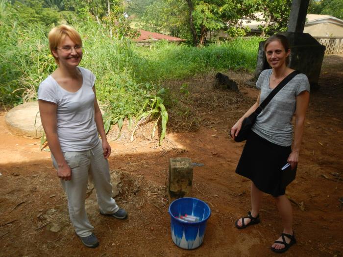 CDC employee Jennifer, and a lab technician in Guéckédou, Guinea during the 2014 West African Ebola outbreak