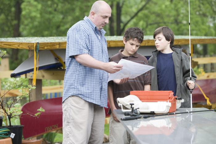 This father and his two sons were about to embark on a freshwater fishing trip.