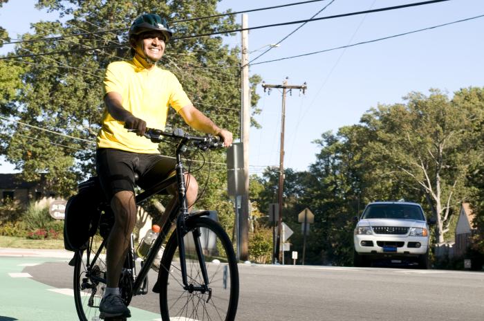 smiling male bicyclist