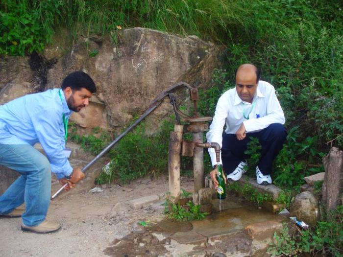 Doctors checking drinking water source