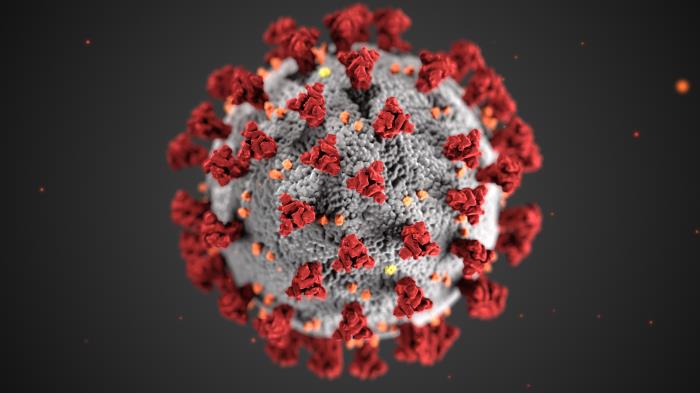 Modelo tridimensional do novo coronavírus em vermelho e amarelo
